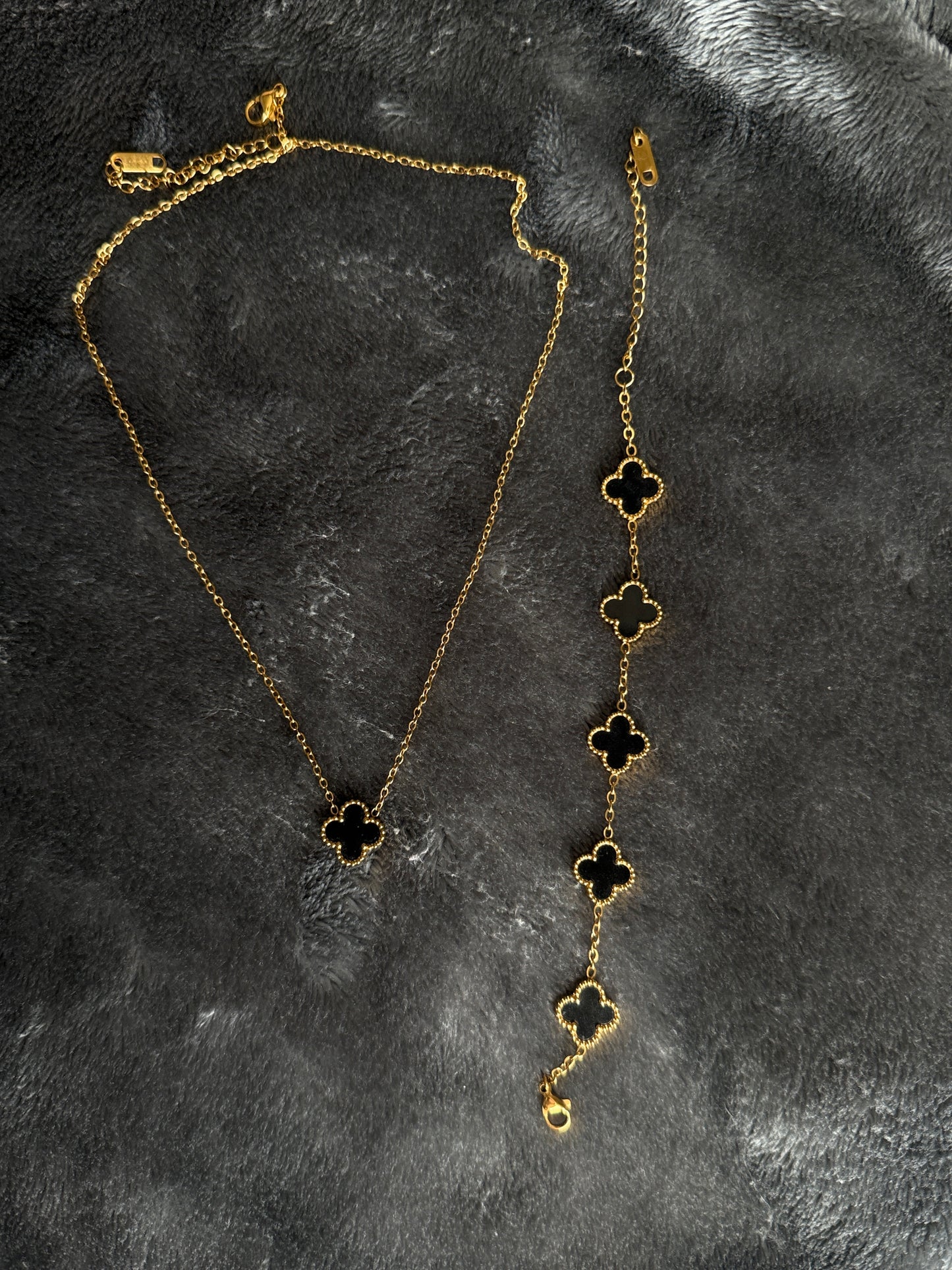 Black flower design necklace and bracelet gold plated
