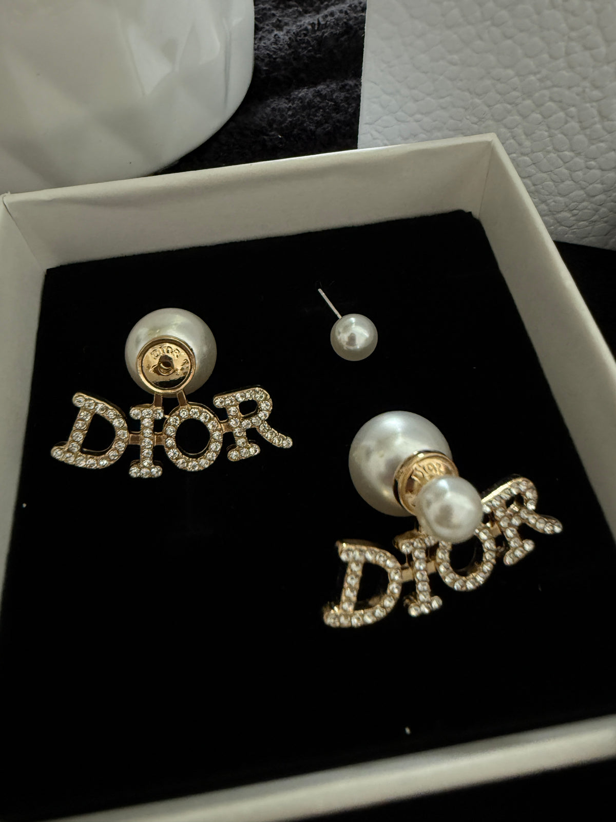 CD pearl logo earrings with premium packaging