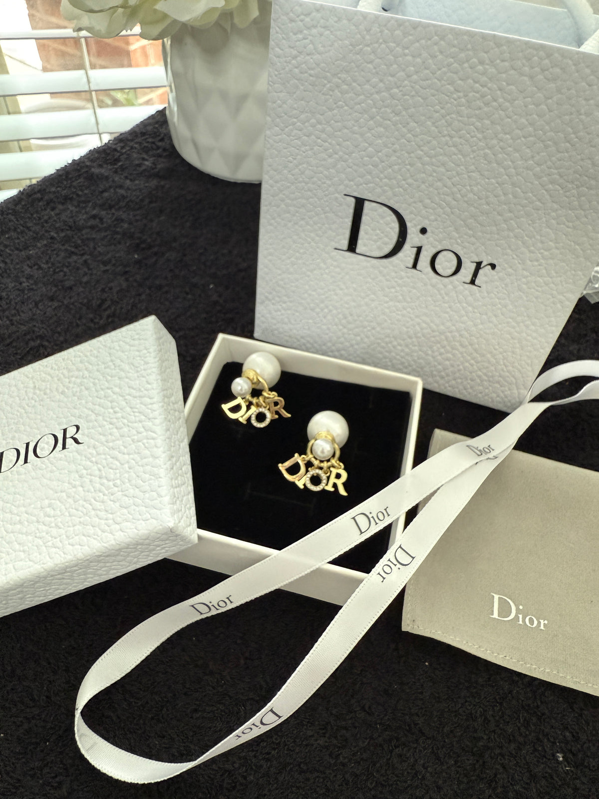 C D earrings with premium packaging
