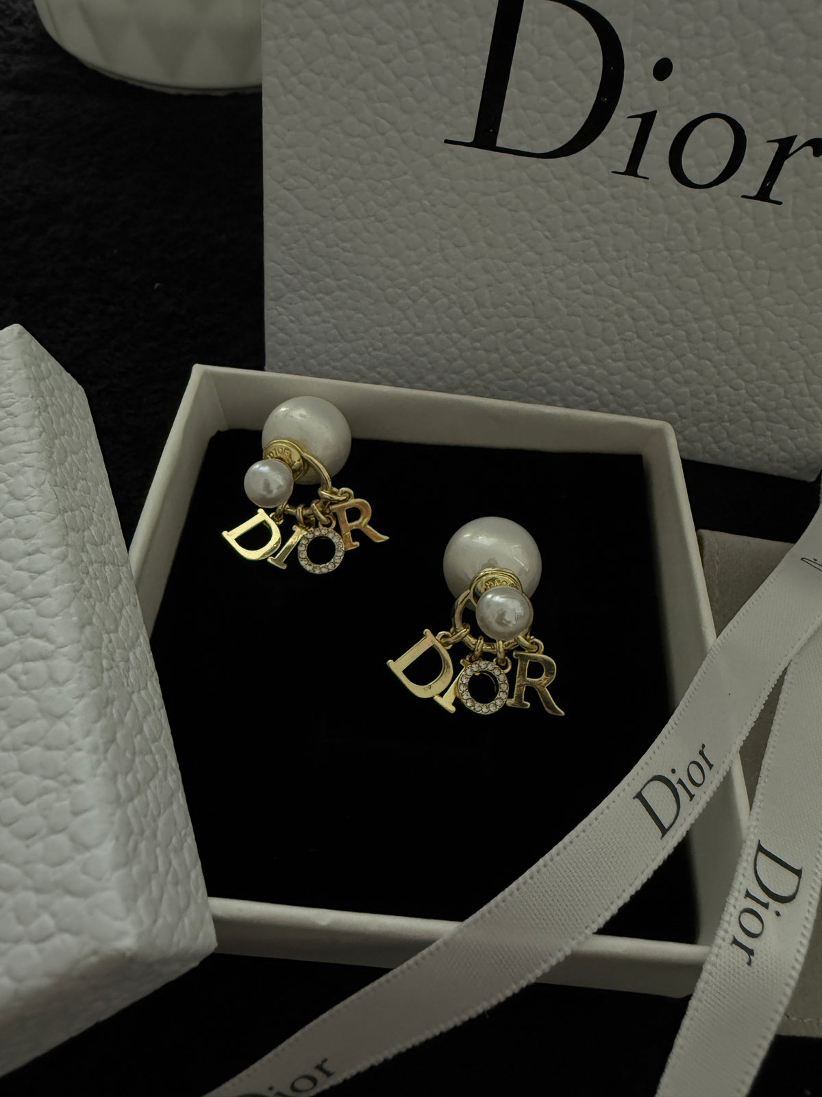 C D earrings with premium packaging