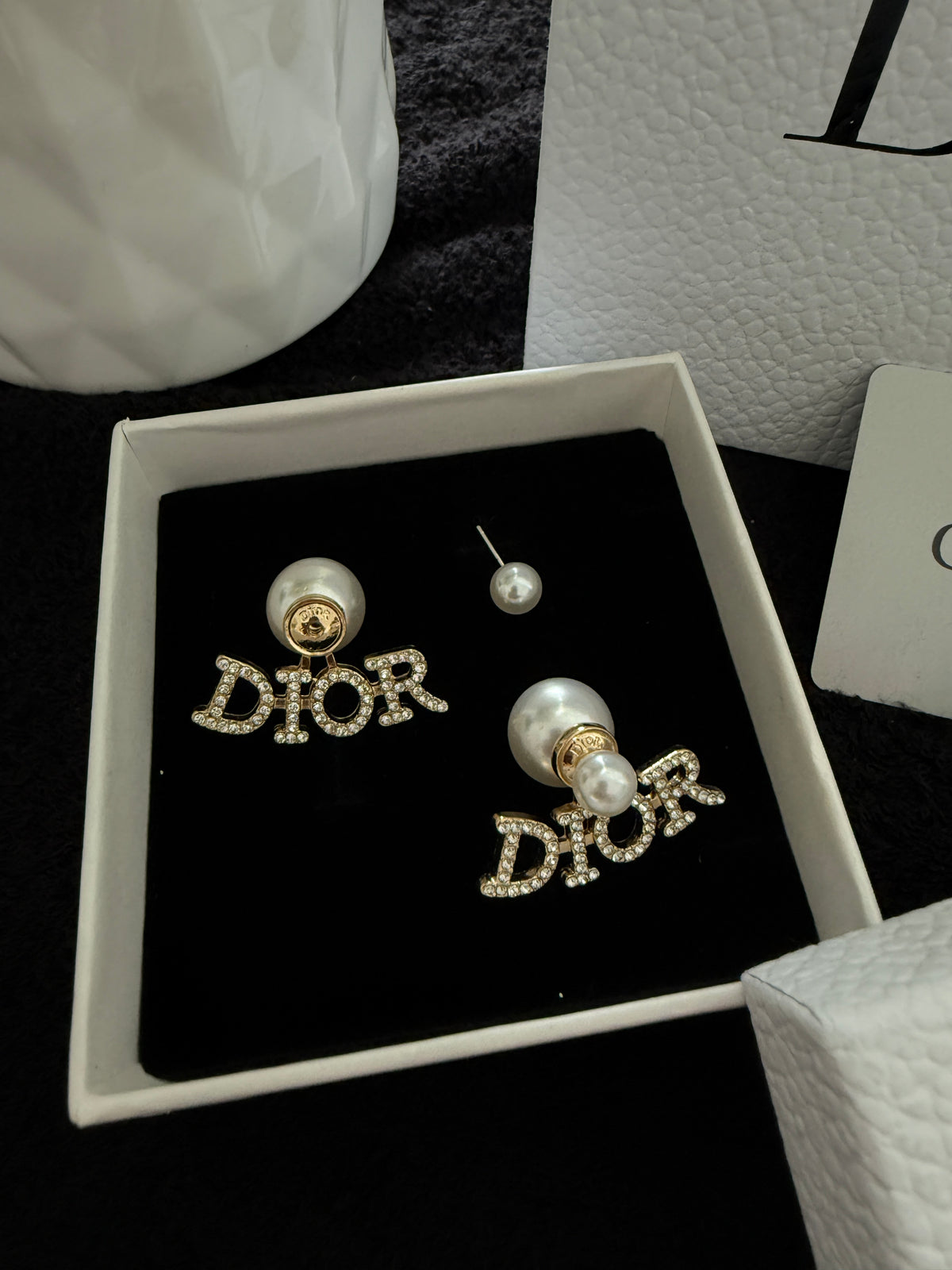 CD pearl logo earrings with premium packaging