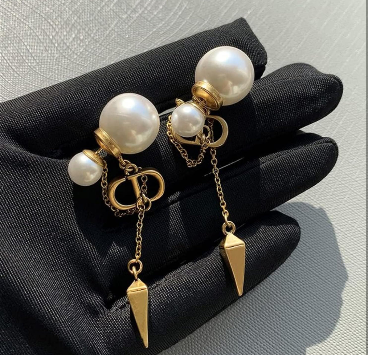 C D hanging pearl earrings
