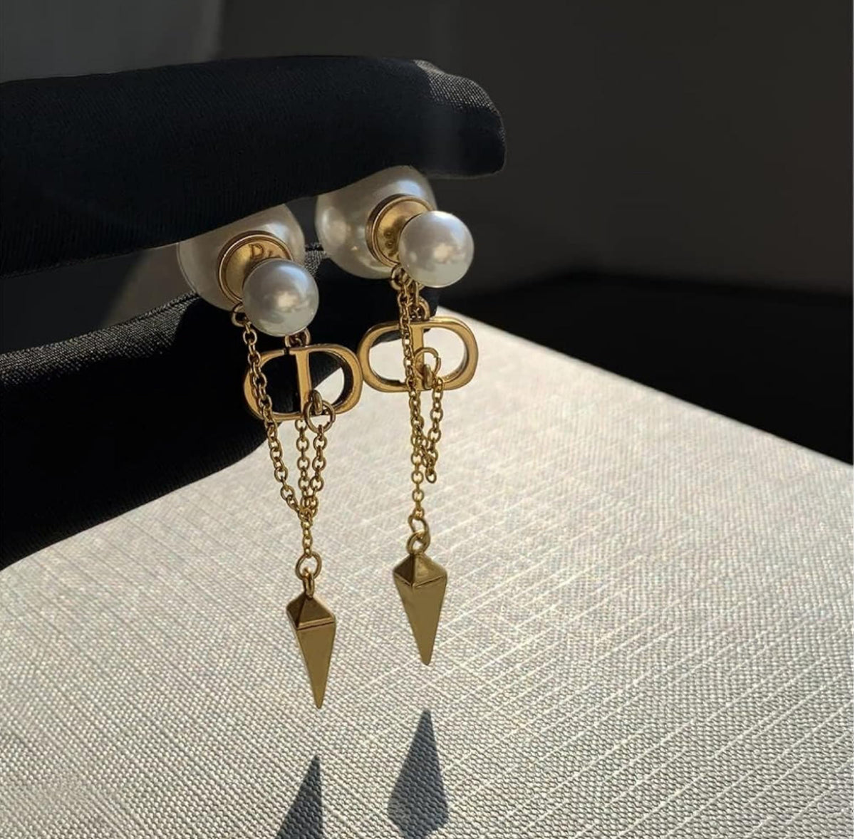 C D hanging pearl earrings