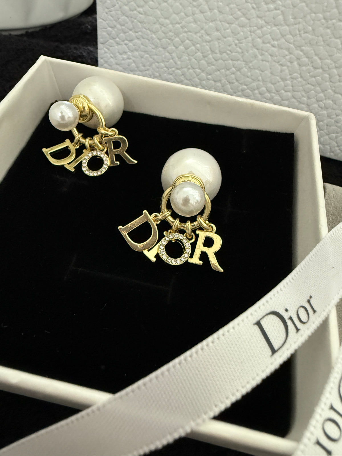 C D earrings with premium packaging